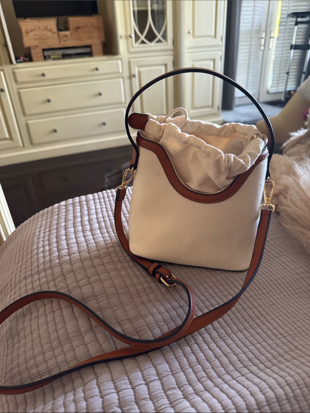 Tan and brown cross body bag